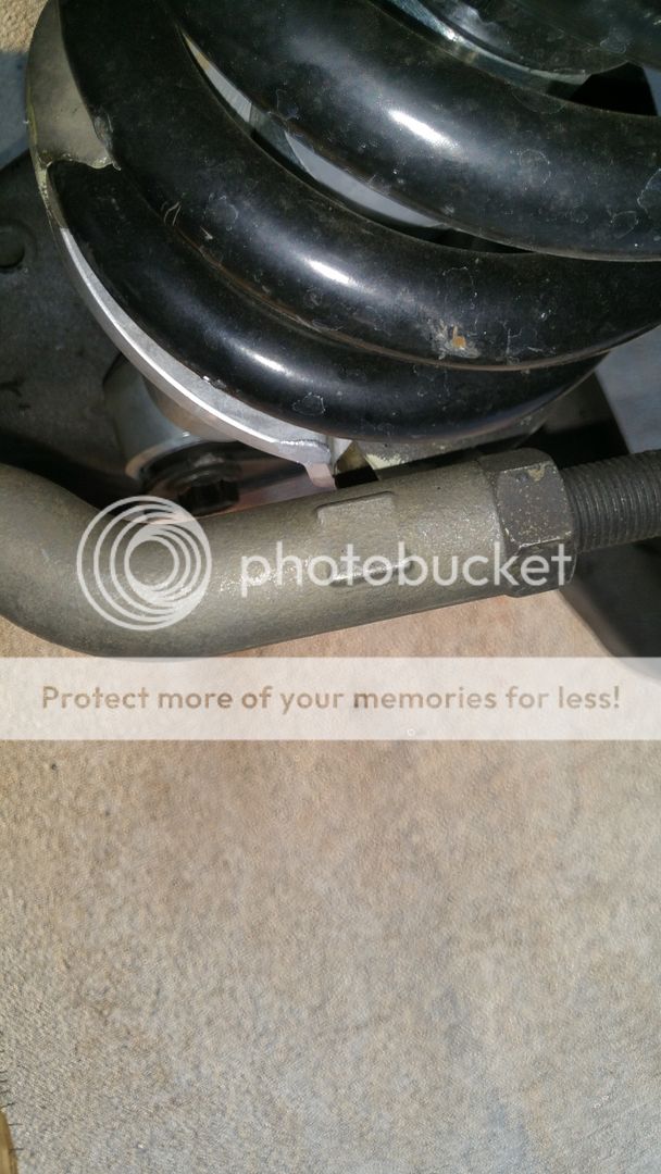 Tie rods hitting Bilsteins coil mount? Nissan Titan Forum